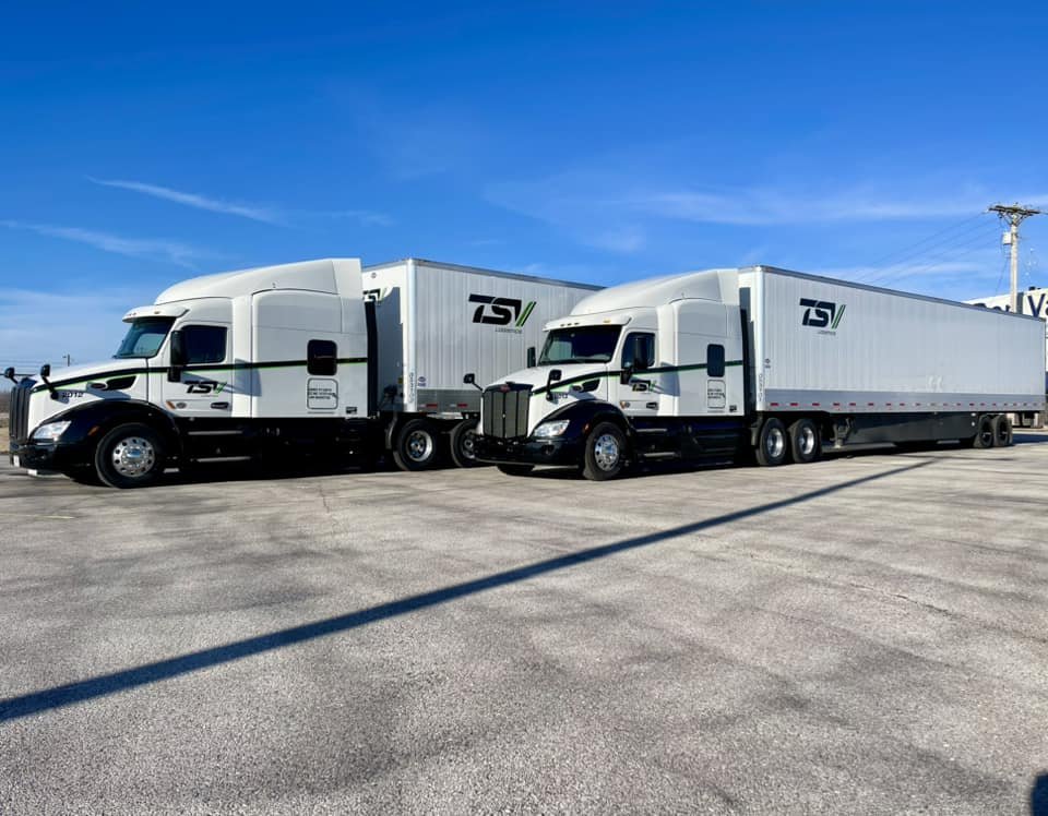 Two TSV Logistics tractor trailers ready to move freight