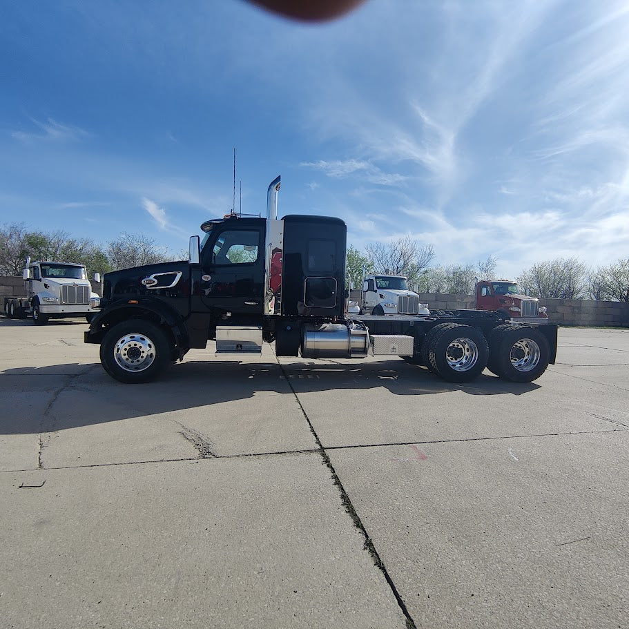 Black commercial tractor prepared for delivery